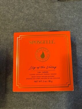 Spongellé Lily of the Valley Exfoliant & Scrub - Orange with Gold Accents